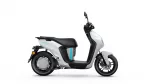 Side view of a silver and black Yamaha scooter with blue accent, showing the left side and drivetrain details