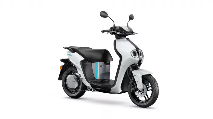 Front three-quarter view of a white and gray modern scooter with black seat and teal accent stripe on the body.