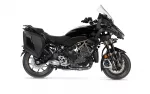 Black Yamaha adventure motorcycle with side-mounted panniers, a tall clear windscreen, and exposed engine, shown in left-front profile.
