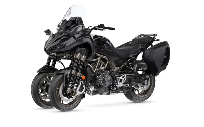 Black sport-t touring motorcycle with hard side panniers, angled profile shown from front-left side.