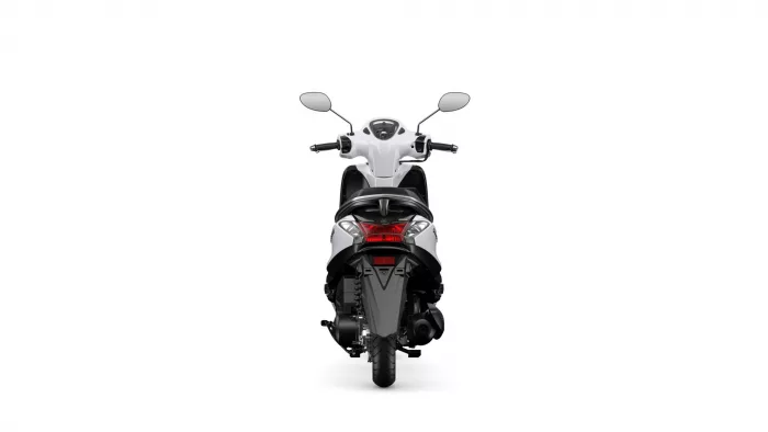 Rear view of a white scooter with red taillight, centered on a white background.