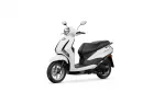 White scooter shown from a side-front angle with headlight, chrome mirrors, and a black seat.