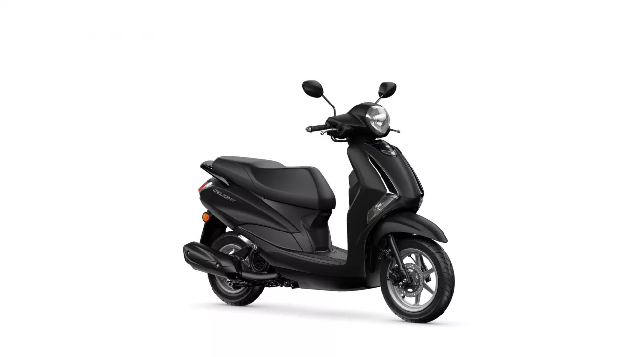 Side view of a glossy black scooter with two mirrors and a large headlight in front