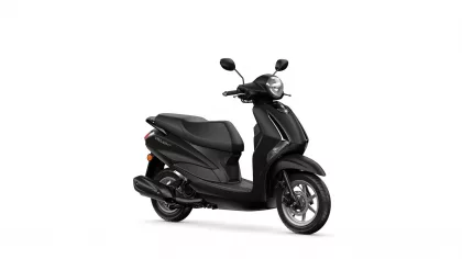 Side view of a glossy black scooter with two mirrors and a large headlight in front