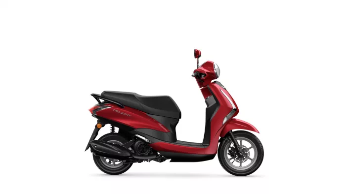 Side view of a red scooter on a white background, showing the seat, handlebars, and front wheel.