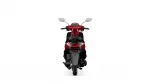 Rear view of a red scooter showing the taillights, seat, and handlebars against a white background