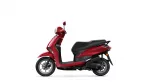 Red scooter shown in side profile with black seat against a white background, highlighting its body panels and wheels.