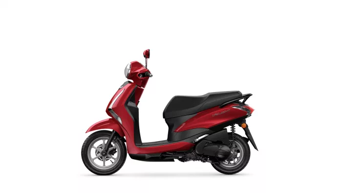 Red scooter shown in side profile with black seat against a white background, highlighting its body panels and wheels.