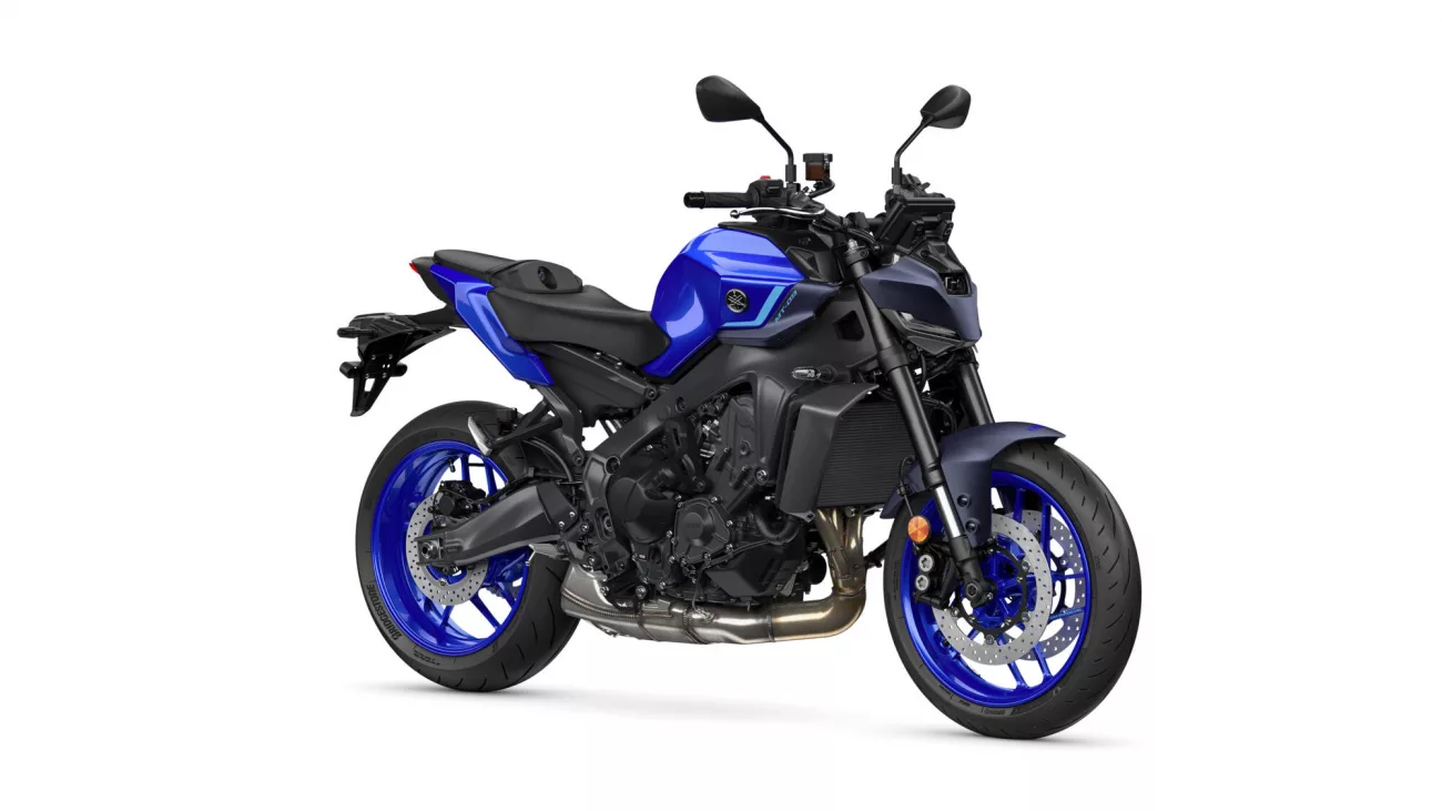 Blue Yamaha sport motorcycle shown from a front-right angle with exposed engine and blue rims on a white background.