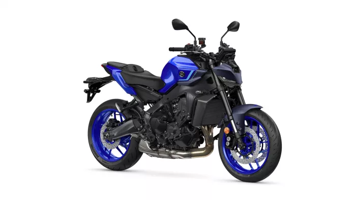 Blue Yamaha sport motorcycle shown from a front-right angle with exposed engine and blue rims on a white background.