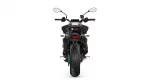 Rear view of a black sport motorcycle with a large rear tire, taillight, and mirrors on a white background