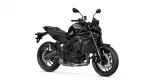 Black Yamaha sport motorcycle shown in a three-quarter front view against a white background.