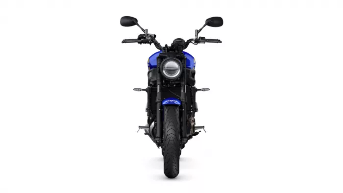 Front view of a blue Yamaha motorcycle with round headlight and mirrors on each side