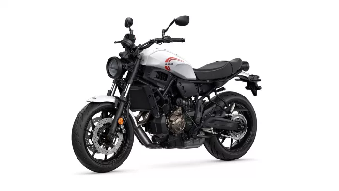 White Yamaha motorcycle shown in a side-front view with a white fuel tank, black chassis, and single-seat.
