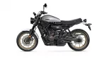 Side profile of a silver Yamaha XSR700 motorcycle with gold alloy wheels and black frame, shown on a white background.