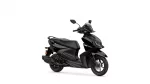 Black Yamaha scooter shown in a side-front angle, highlighting its sleek glossy body and headlight assembly