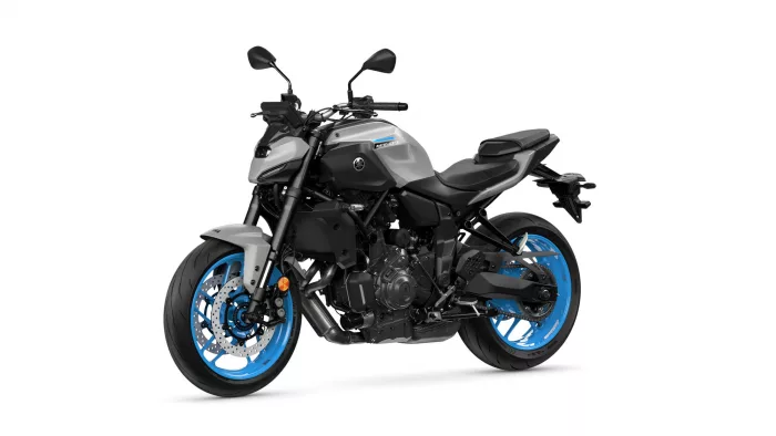 Yamaha MT-07 sport motorcycle facing left, grey fuel tank, black frame, and bright blue rims on a white background.