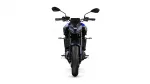 Front view of a blue sport motorcycle facing the camera on a white background, with black handlebars and mirrors.