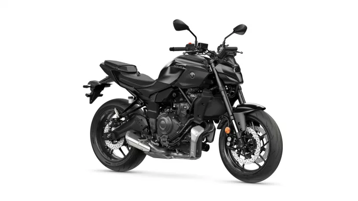 Black Yamaha MT-07 sport motorcycle shown from its left/front-quarter, highlighting its matte black body and exposed engine.