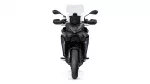 Front view of a dark gray adventure motorcycle with a tall windscreen, mirrors, and dual headlights