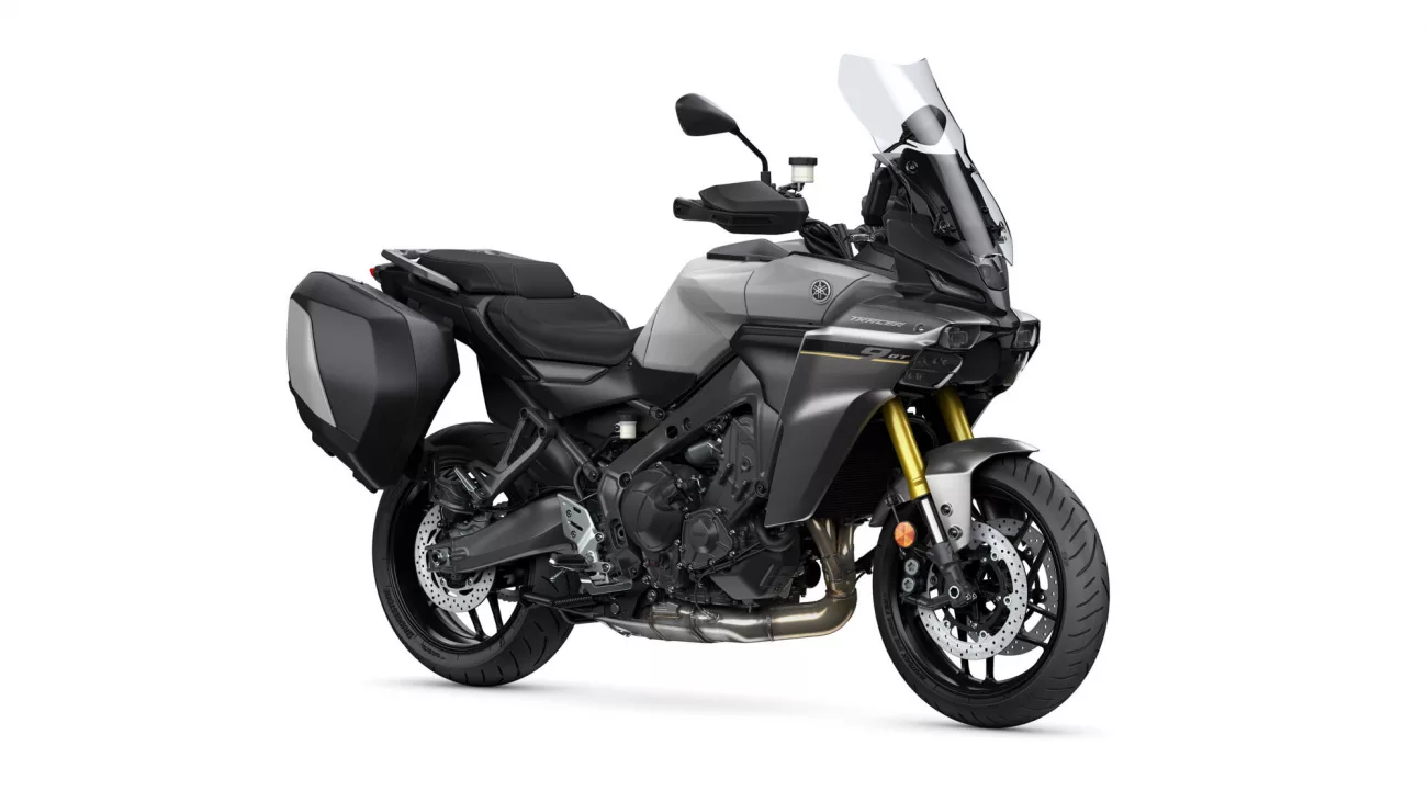 Gray Yamaha sport-touring motorcycle with black hard side panniers and a tall windshield.",