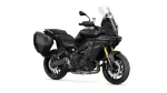 Black Yamaha Tracer GT sport-touring motorcycle with hard panniers and a tall windscreen on a white background
