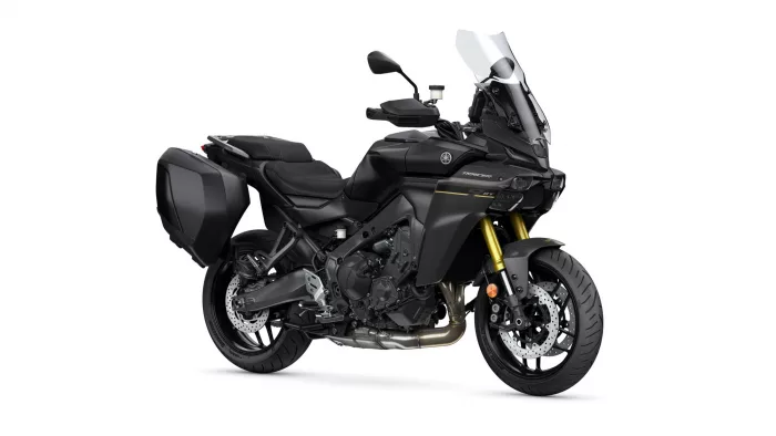 Black Yamaha Tracer GT sport-touring motorcycle with hard panniers and a tall windscreen on a white background