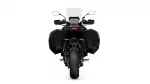 Rear view of a black adventure motorcycle with large side panniers and a windshield key feature.