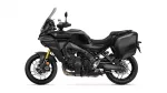 Black Yamaha Tracer GT sport-touring motorcycle with side panniers and tall windscreen viewed in profile.
