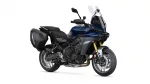Blue Yamaha Tracer touring motorcycle shown in side view with hard panniers and tall windshield (front-right angle)