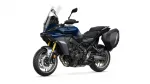Blue Yamaha Tracer 9 GT adventure motorcycle with windscreen and side panniers on a white background