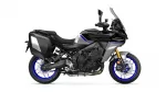 Black and silver Yamaha Tracer sport-touring motorcycle with blue accent stripes and side panniers.