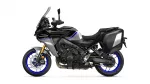 Yamaha Tracer 9 GT sport-touring motorcycle with side panniers and blue rim accents in profile.