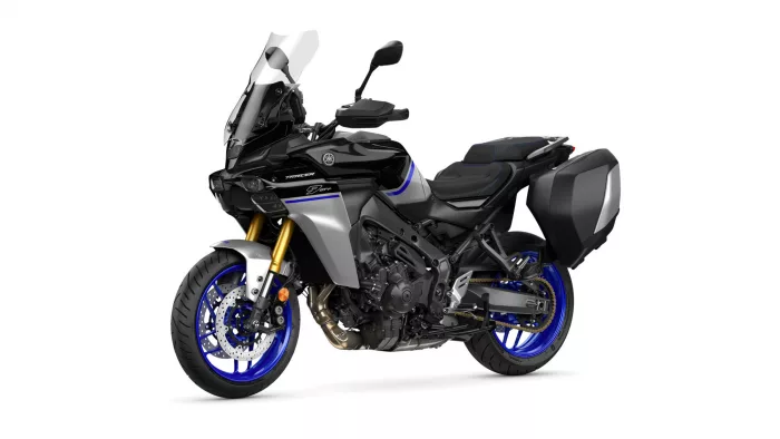 Black and silver Yamaha sport-touring motorcycle with blue rims and panniers, shown from front-right axis