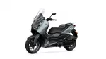 Yamaha scooter shown in a front-left angle with a tall clear windscreen and gray-black bodywork, isolated on white.