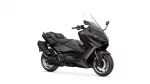 Dark Yamaha sport-t touring motorcycle photographed from the right-front side, showing windshield, dual-disc front brakes and sleek bodywork.
