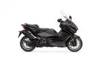 Side view of a dark Yamaha Tmax sport scooter with windshield, shown in profile on a white background