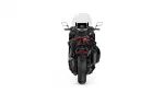 Rear view of a black sport motorcycle with a tall, translucent windscreen on a white background.