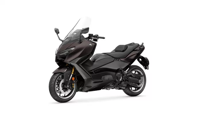 Dark gray sport-tourer motorcycle with a tall windshield, shown from a front-side angle