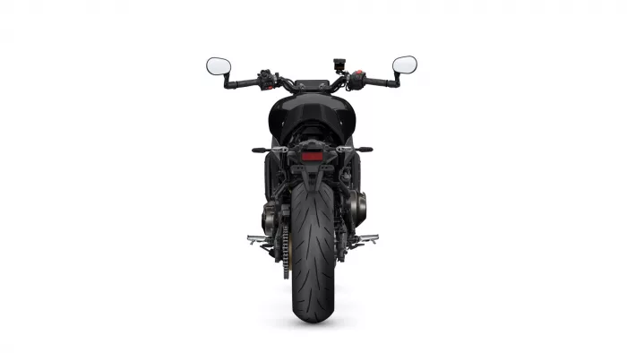 Rear view of a black motorcycle on a white background, showing the wide rear tire, taillight, and handlebars with mirrors on both sides