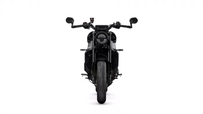 Front view of a black motorcycle head-on, showing the round headlight, handlebars, mirrors, and front tire against a white background