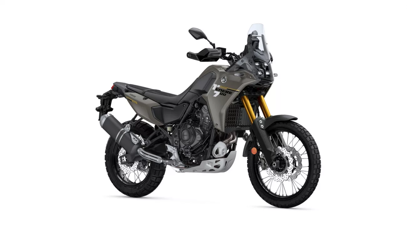 Front-right view of a Yamaha Tenere 700 adventure motorcycle, showing olive-gray body, rugged tires, and gold front forks.
