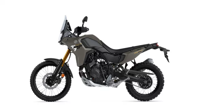 Yamaha Tenere 700 adventure motorcycle shown in side profile with olive body and black seat.