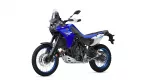 Side view of a blue Yamaha Tenere 700 adventure motorcycle with white accents and off-road tires