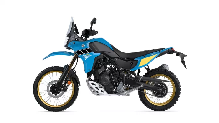 Blue Yamaha Ténéré 700 adventure motorcycle shown in side profile.
