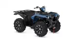 Blue all‑terrain vehicle (ATV) with large knobby tires and front/rear racks, angled to show its body and handlebars for off‑road riding.