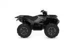 Black Yamaha Grizzly ATV with large off-road tires and front/rear racks from a side view