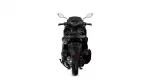 Rear view of a black sport motorcycle against a white background, showing taillight area and dual exhausts partly visible at the sides.