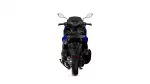 Rear view of a blue sport motorcycle, showing the taillight, seat, and wide rear tire centered against a white background.