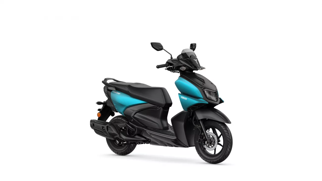 teal-and-black Yamaha scooter with a turquoise front panel and black seat, shown from a three-quarter front view